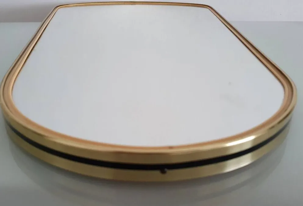 Grand miroir ovoïde vintage à bords dorés et noir - années 1960