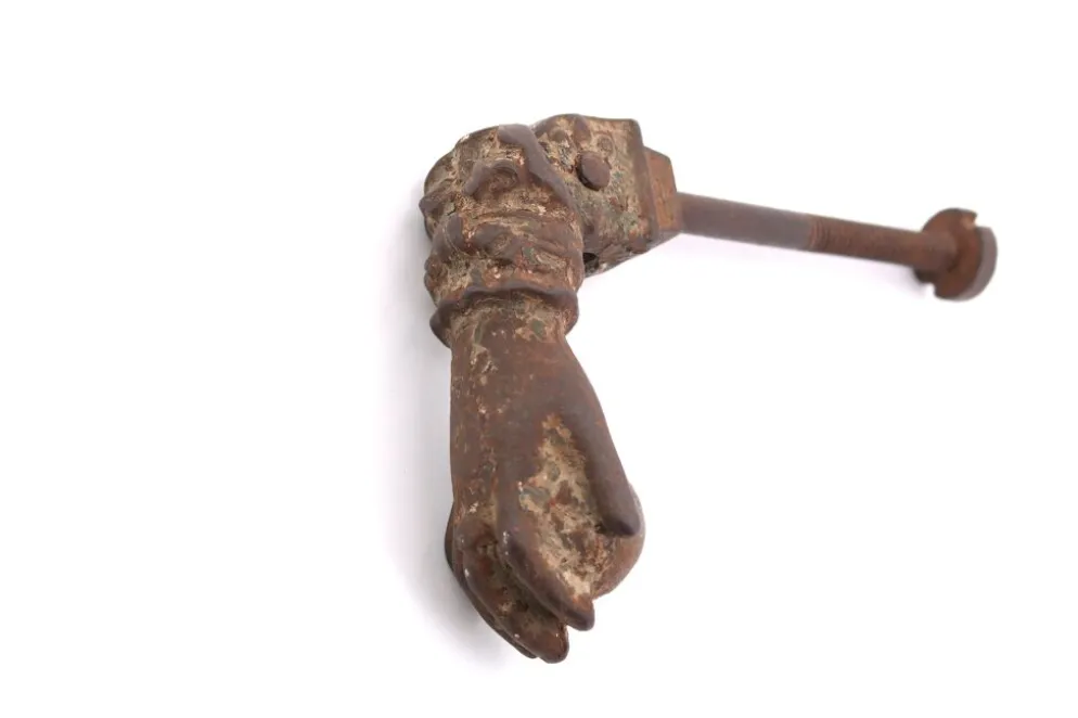 Heurtoir de porte en forme de main, années 30