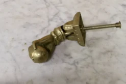 Heurtoir en bronze plein, forme de main, XIXème