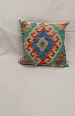Housse de coussin géométrique turquoise, coussin en laine kilim vintage pour décoration intérieure.