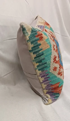 Housse de coussin géométrique turquoise, coussin en laine kilim vintage pour décoration intérieure.