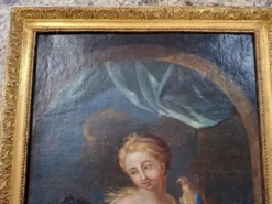 Huile sur toile du début du XVIIIᵉ siècle – Jeune femme au perroquet