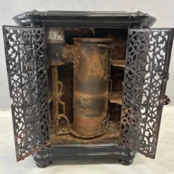 Insert de cheminée décoratif antique en fonte ornée noire style français des années 1900