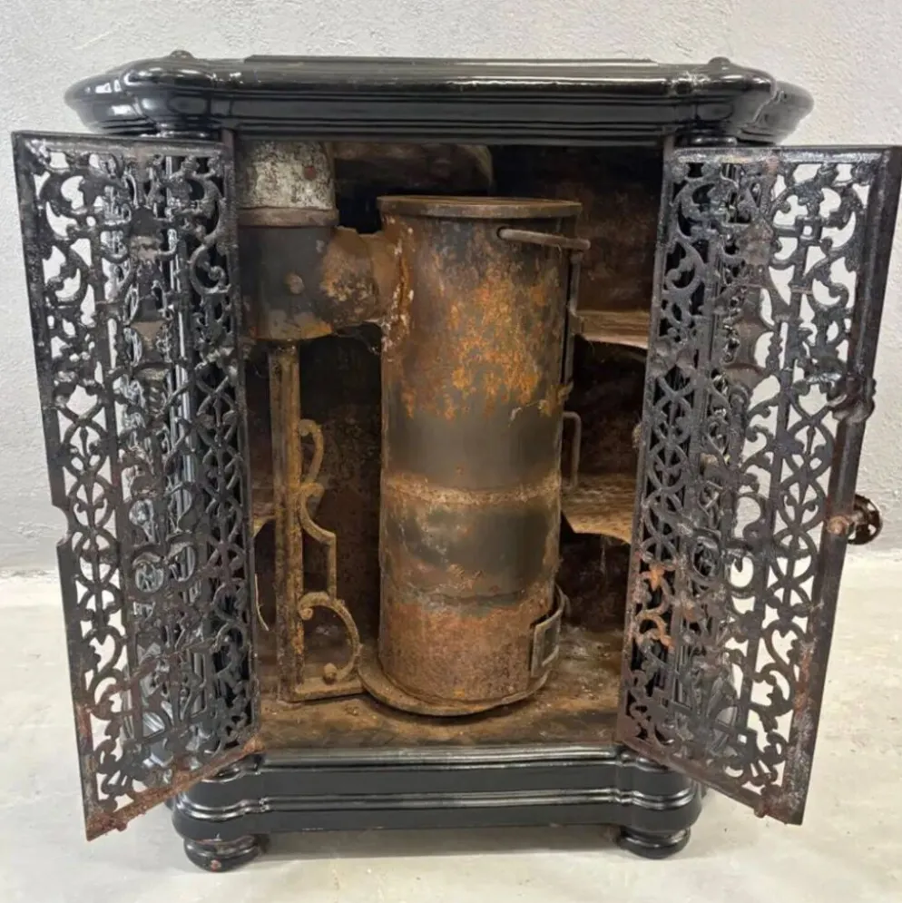 Insert de cheminée décoratif antique en fonte ornée noire style français des années 1900