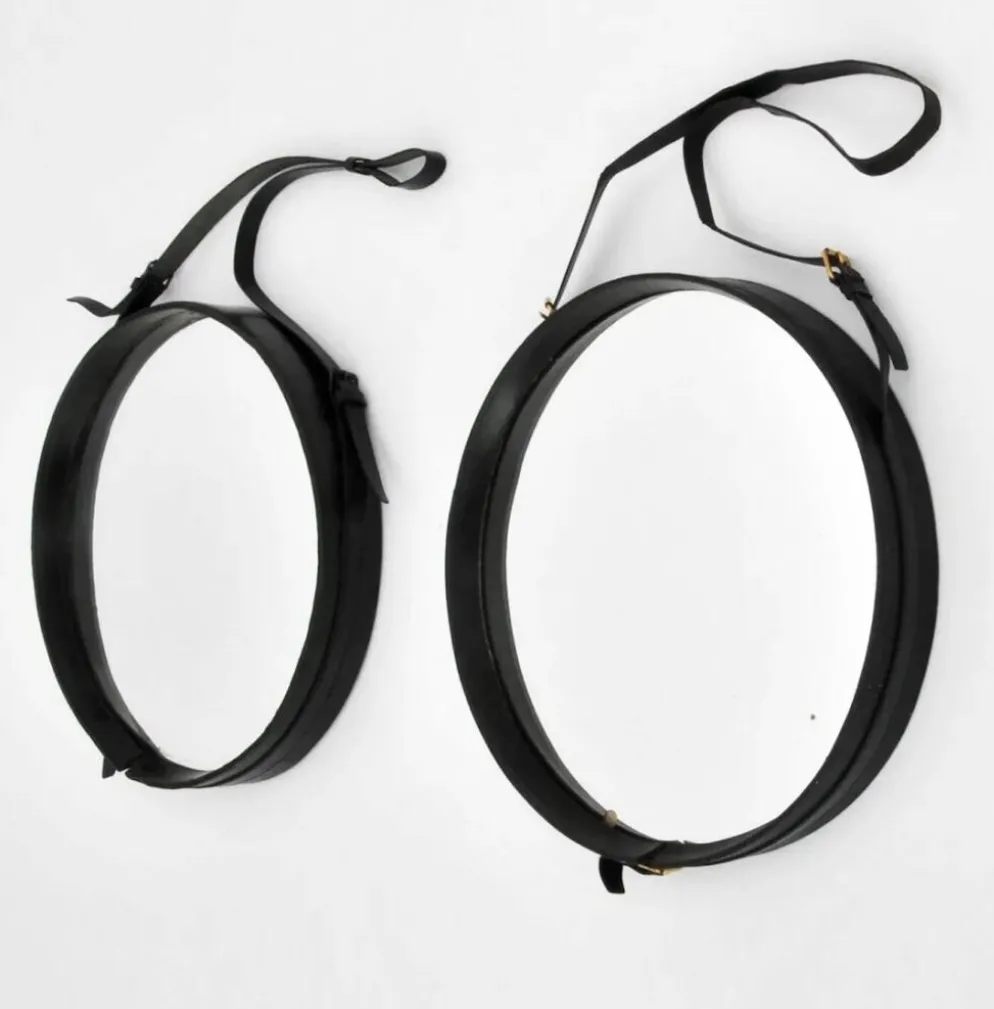Jacques Adnet paire de miroirs circulaires cuir et laiton