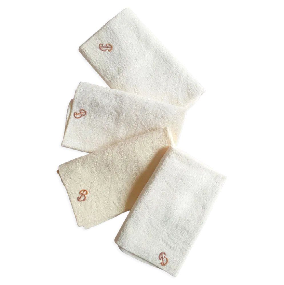 Lot de 4 serviettes anciennes brodées et teintes à la main