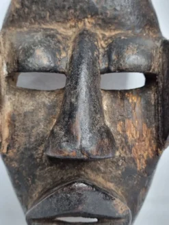 Masque Dan - Côte d'Ivoire - Milieu XXe siècle - Bois sculpté, 24 cm
