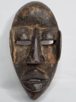 Masque Dan - Côte d'Ivoire - Milieu XXe siècle - Bois sculpté, 24 cm