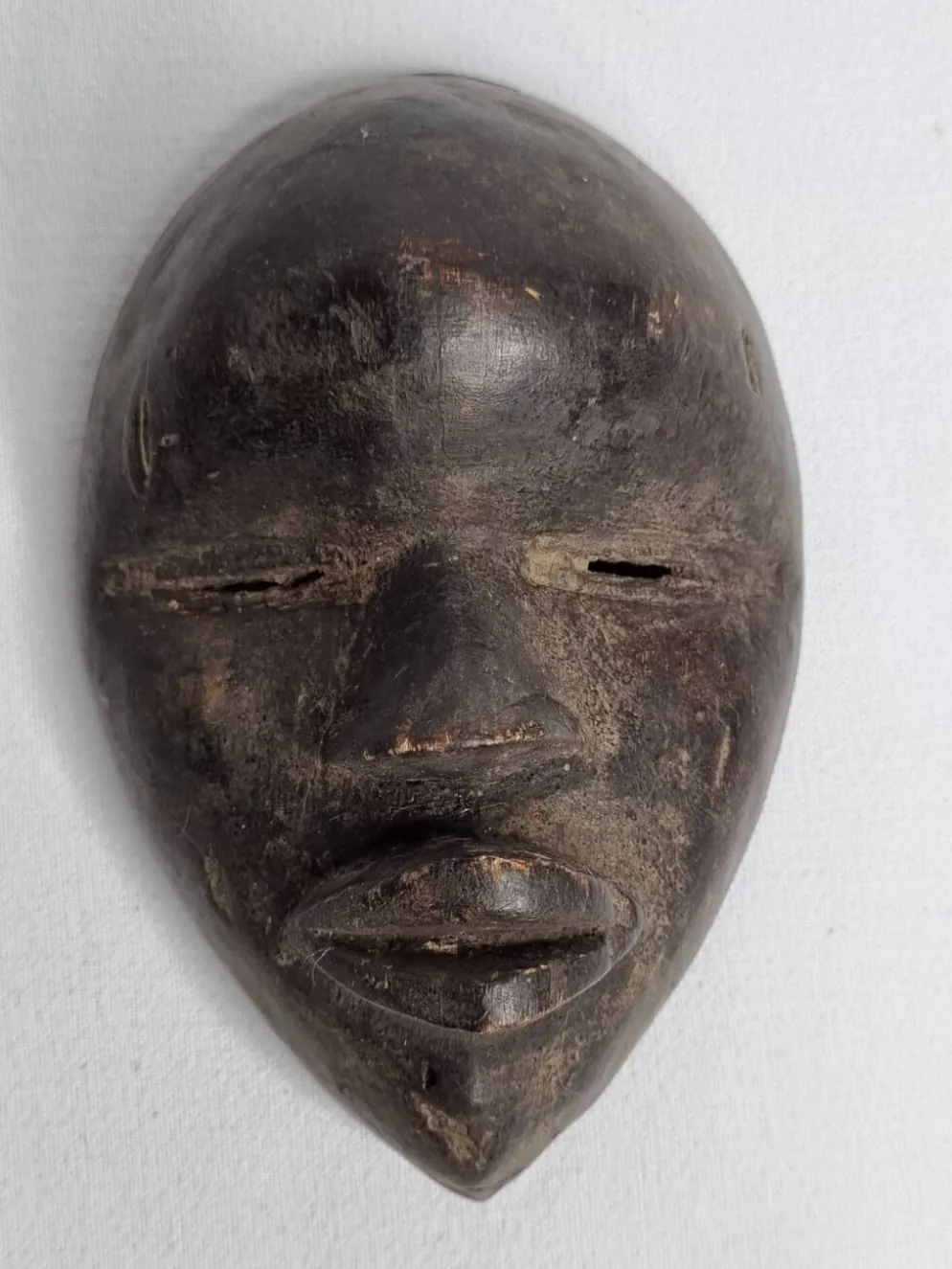 Masque passeport, Dan en bois patiné – Côte d’Ivoire, XXe siècle, 13 cm