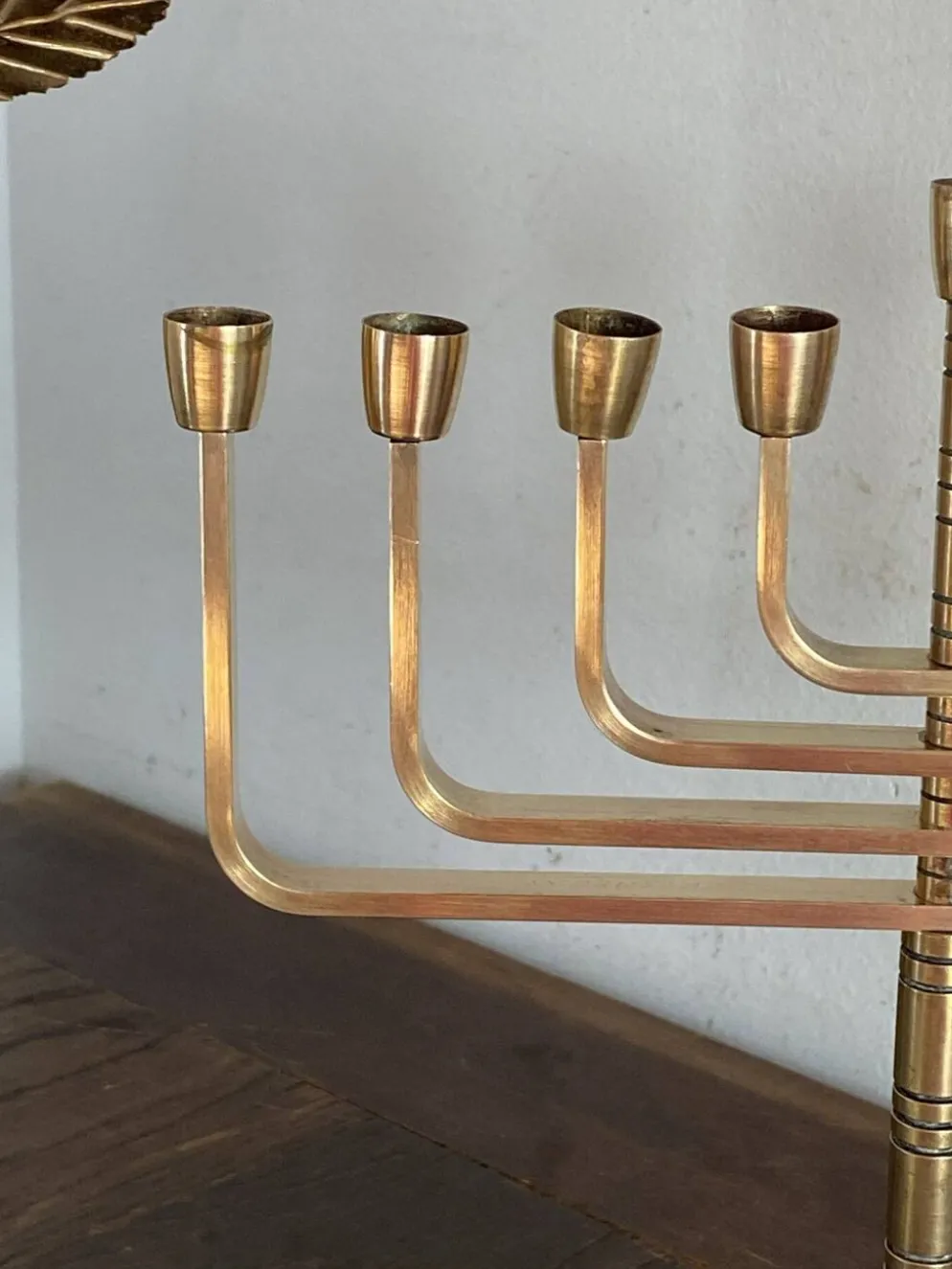 Menorah à neuf branches modulables en laiton