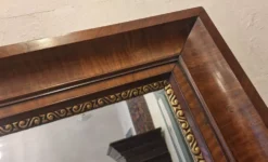 Miroir ancien à biseau dans un cadre en noyer, vers 1850