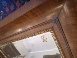 Miroir ancien à biseau dans un cadre en noyer, vers 1850