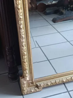 Miroir ancien bois et stuc doré néo Louis XVI