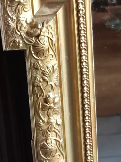 Miroir ancien bois et stuc doré néo Louis XVI