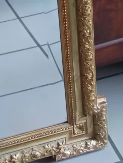 Miroir ancien bois et stuc doré néo Louis XVI