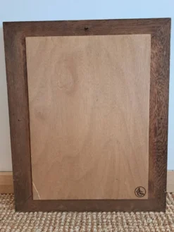 Miroir ancien de style Louis XV en bois et stuc doré.