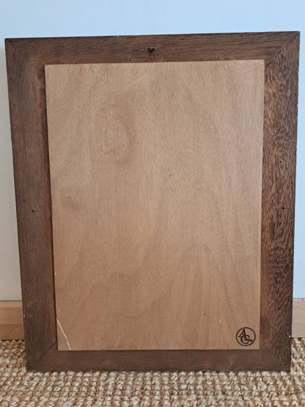 Miroir ancien de style Louis XV en bois et stuc doré.