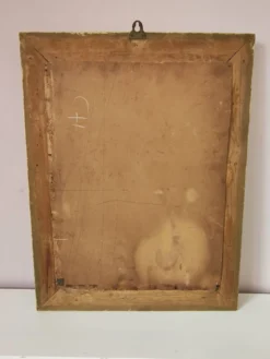Miroir ancien doré richement sculpté