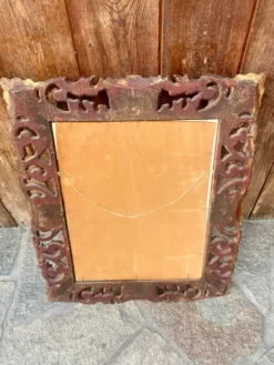 Miroir ancien en bois sculpté