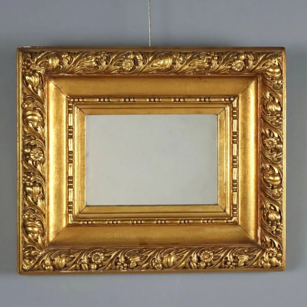 Miroir ancien en bois sculpté et doré, Italie, XXe siècle