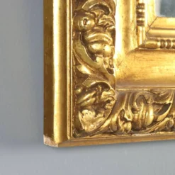 Miroir ancien en bois sculpté et doré, Italie, XXe siècle