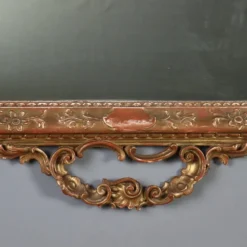 Miroir ancien en bois sculpté et doré, Italie, début XXe siècle