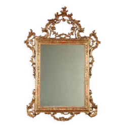 Miroir ancien en bois sculpté et doré, Italie, début XXe siècle
