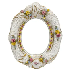 Miroir ancien en porcelaine de Dresde à fleurs en relief décor rocaille