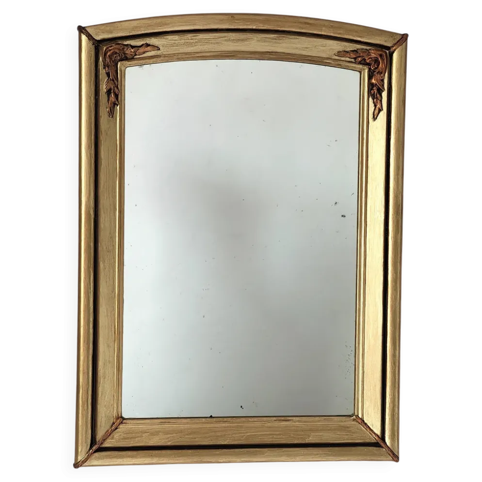Miroir art déco en bois doré et cintré aux décorations florales