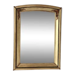 Miroir art déco en bois doré et cintré aux décorations florales