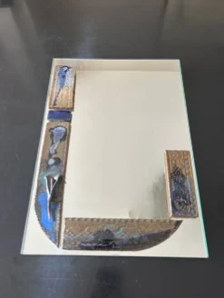 Miroir avec inclusion de céramique