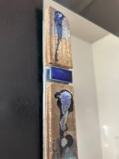 Miroir avec inclusion de céramique