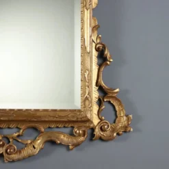 Miroir baroque ancien en bois sculpté et doré, Italie, XXe siècle