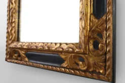 Miroir baroque en bois noir et doré sculpté, France années 1850.