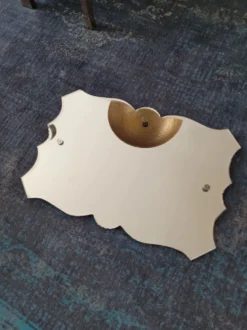 Miroir biseauté ancien à suspendre