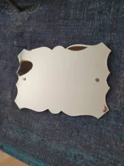 Miroir biseauté ancien à suspendre