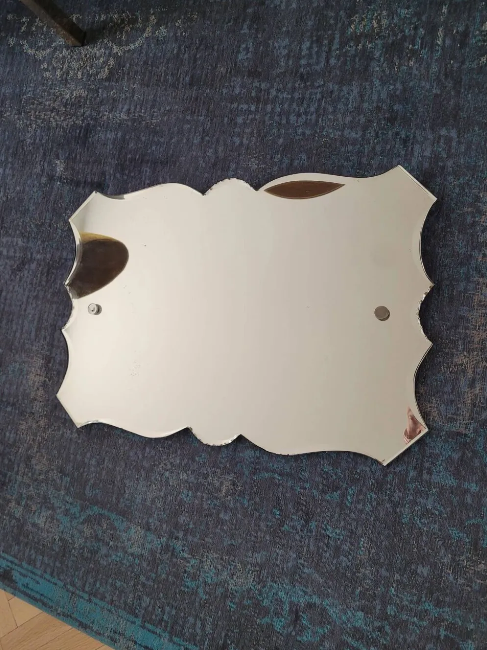 Miroir biseauté ancien à suspendre
