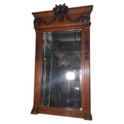 Miroir biseauté en bois sculpté