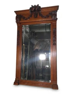 Miroir biseauté en bois sculpté