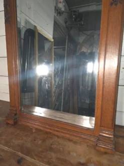 Miroir biseauté en bois sculpté