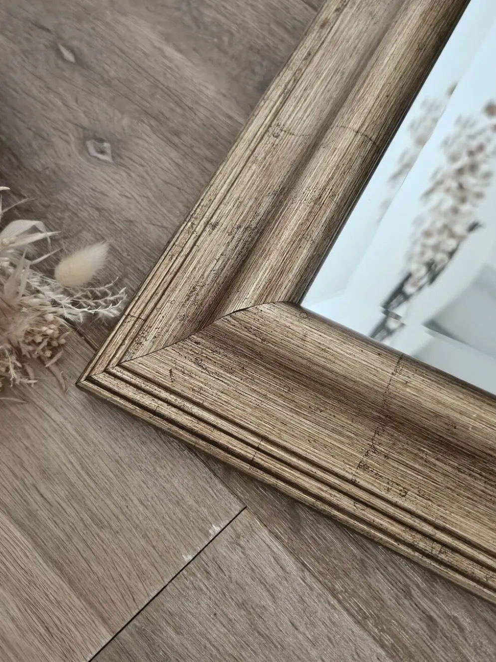 Miroir biseauté sous cadre doré