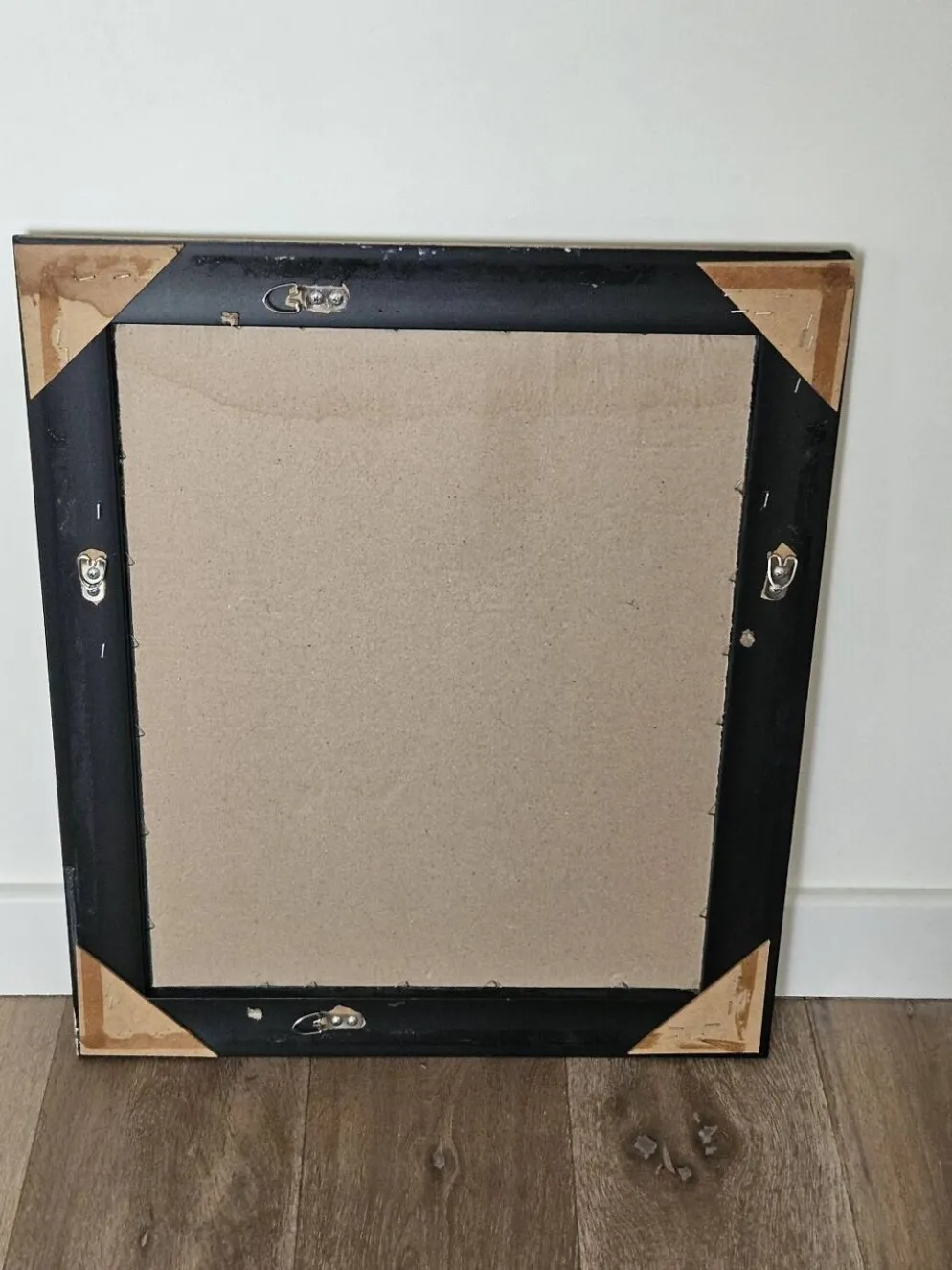 Miroir biseauté sous cadre doré