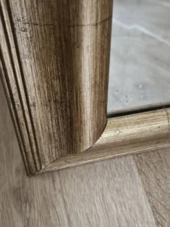 Miroir biseauté sous cadre doré