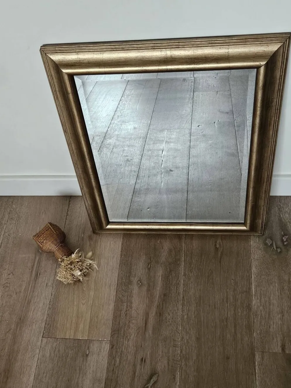 Miroir biseauté sous cadre doré