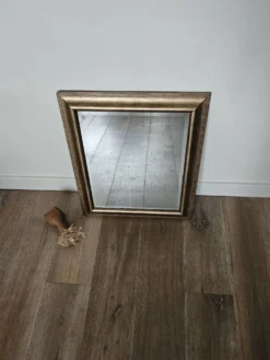 Miroir biseauté sous cadre doré