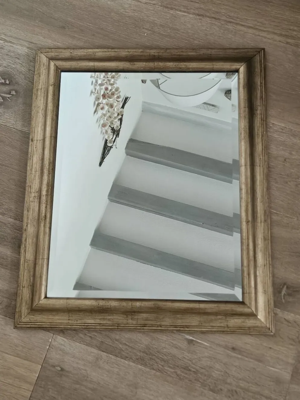 Miroir biseauté sous cadre doré