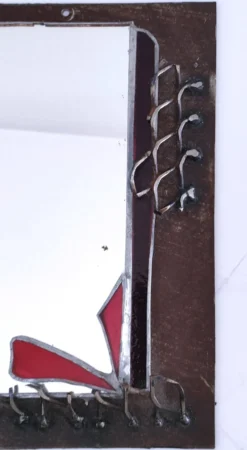 Miroir brutaliste métal et verre serti