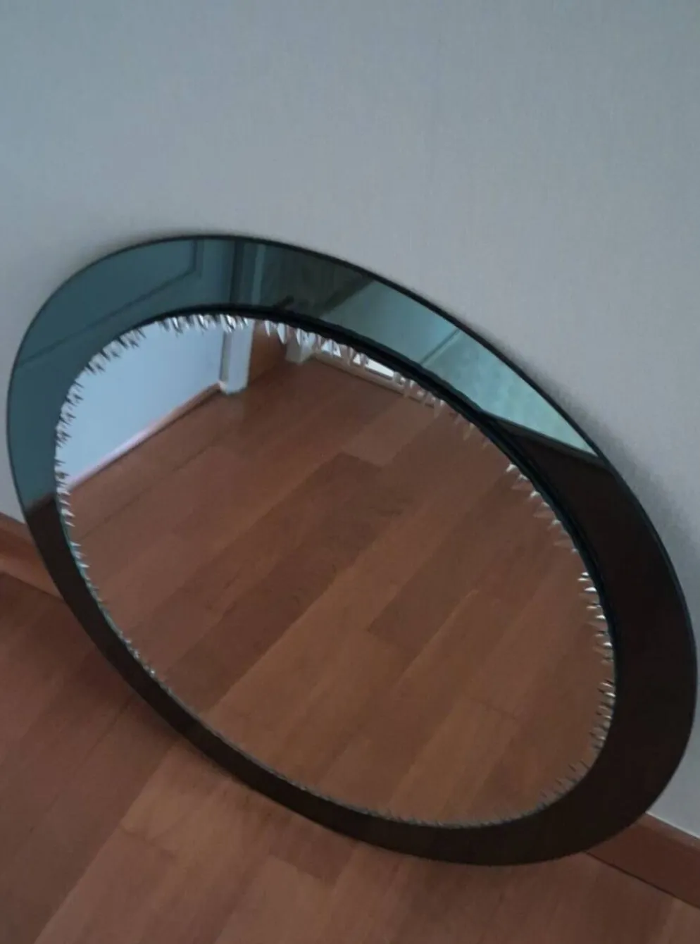 Miroir ciselé biseauté