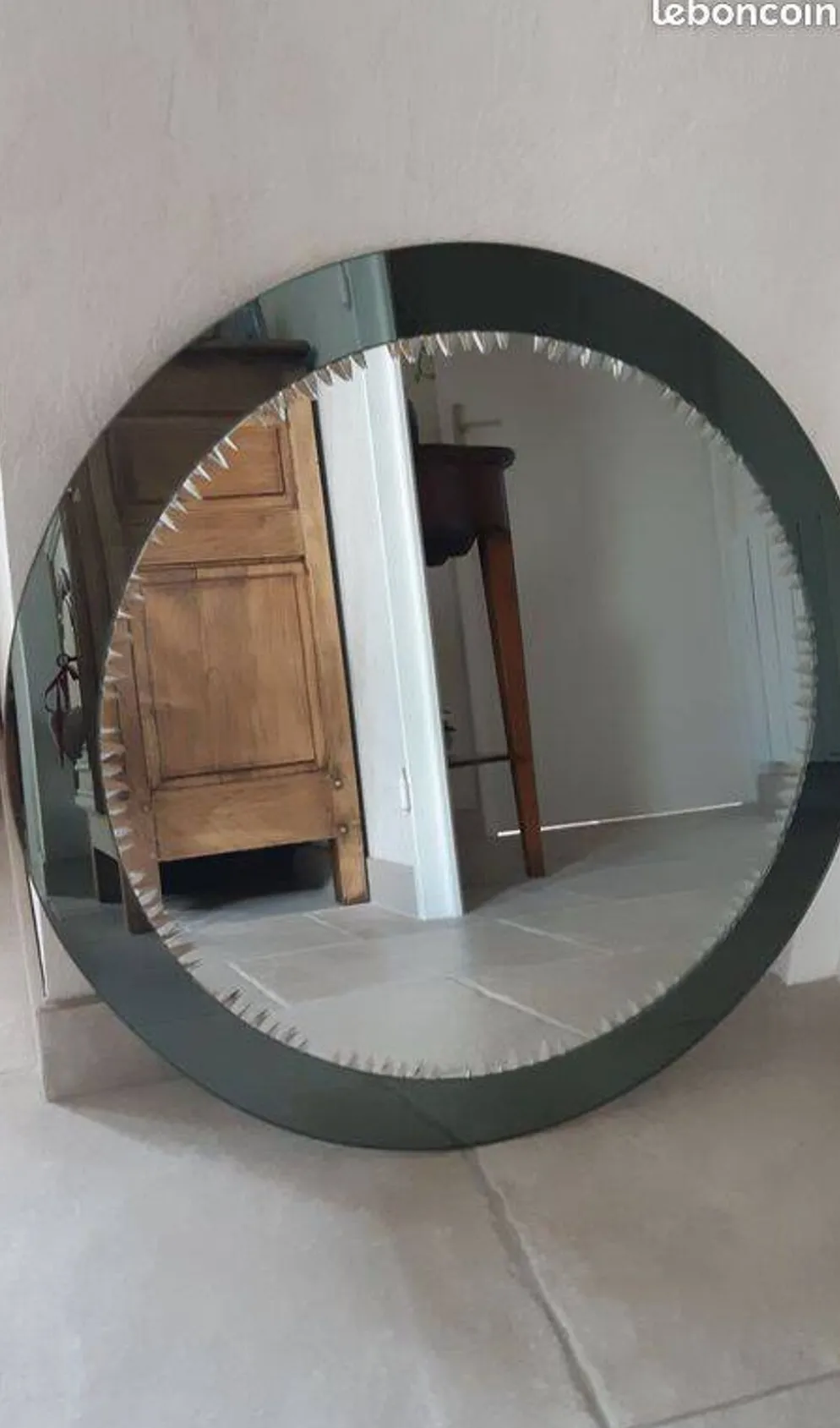 Miroir ciselé biseauté