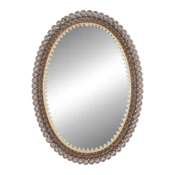 Miroir cisele entouré de metal